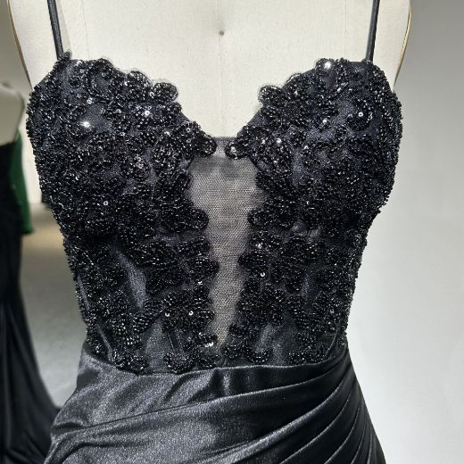 A deep V-neckline in a heart-shaped design with sheer mesh.​