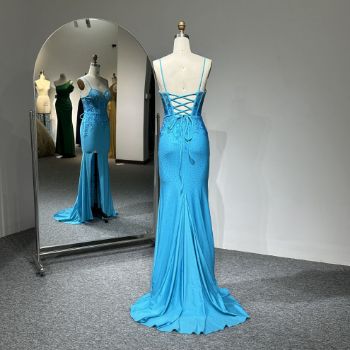 The intricately strapped back delivers an artfully provocative silhouette, inviting the gaze to wander.