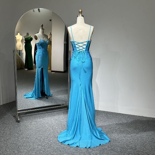 The intricately strapped back delivers an artfully provocative silhouette, inviting the gaze to wander.